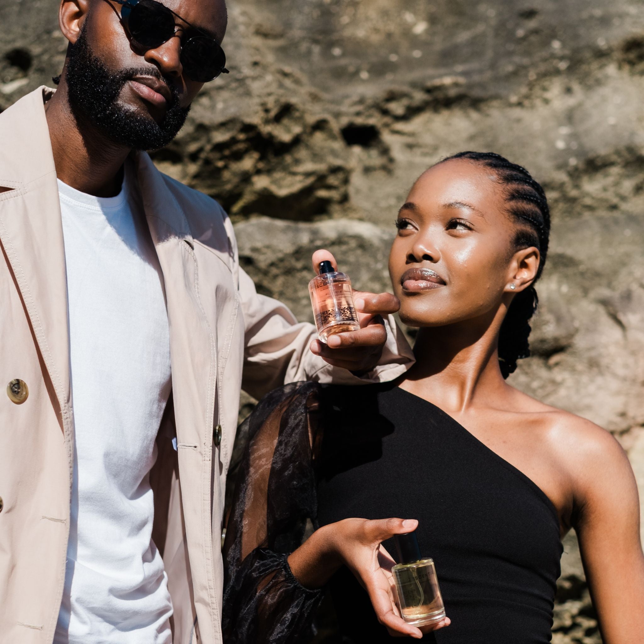  Man and woman posing with the most affordable fragrances in South Africa