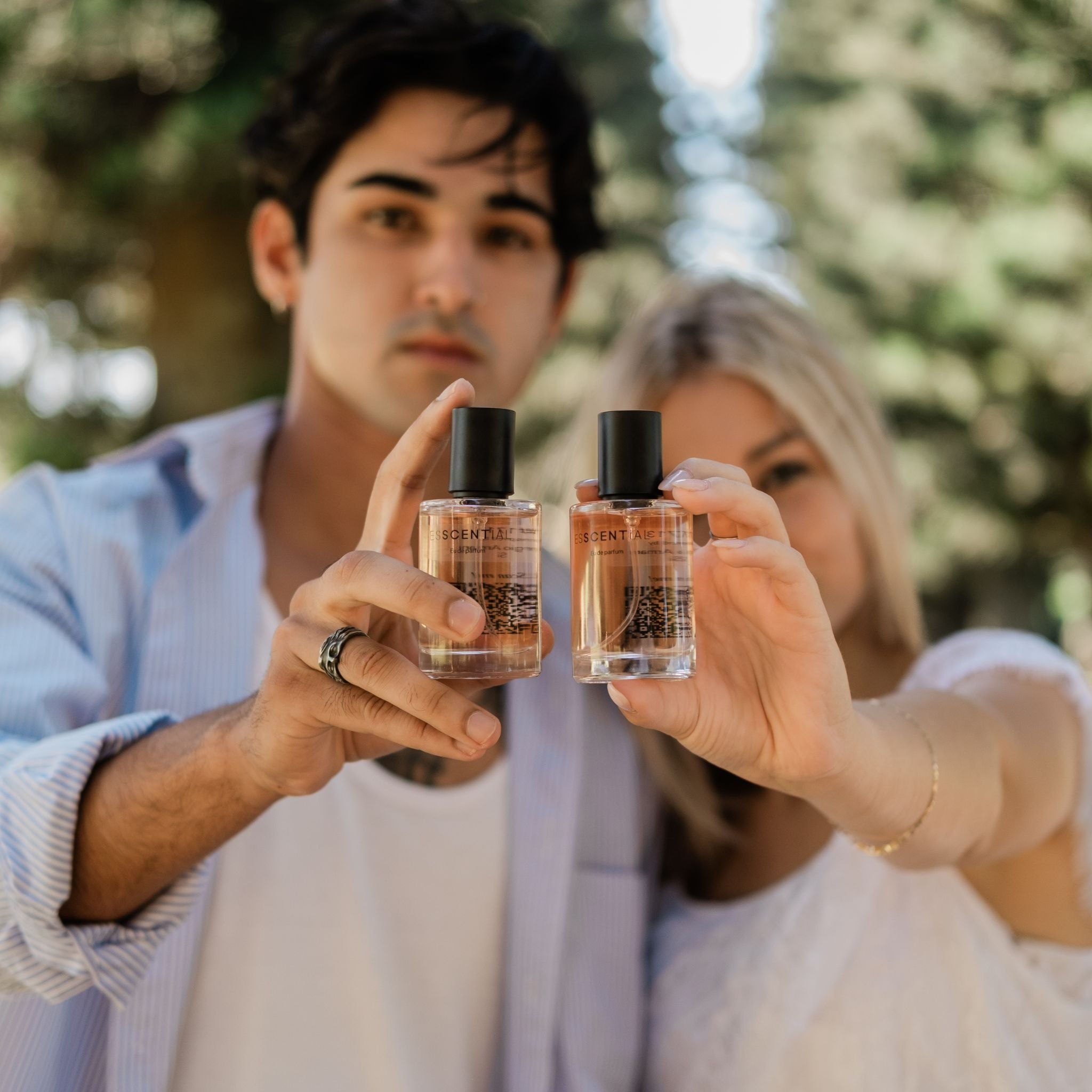  Man and woman holding affordable inspired by fragrance South Africa