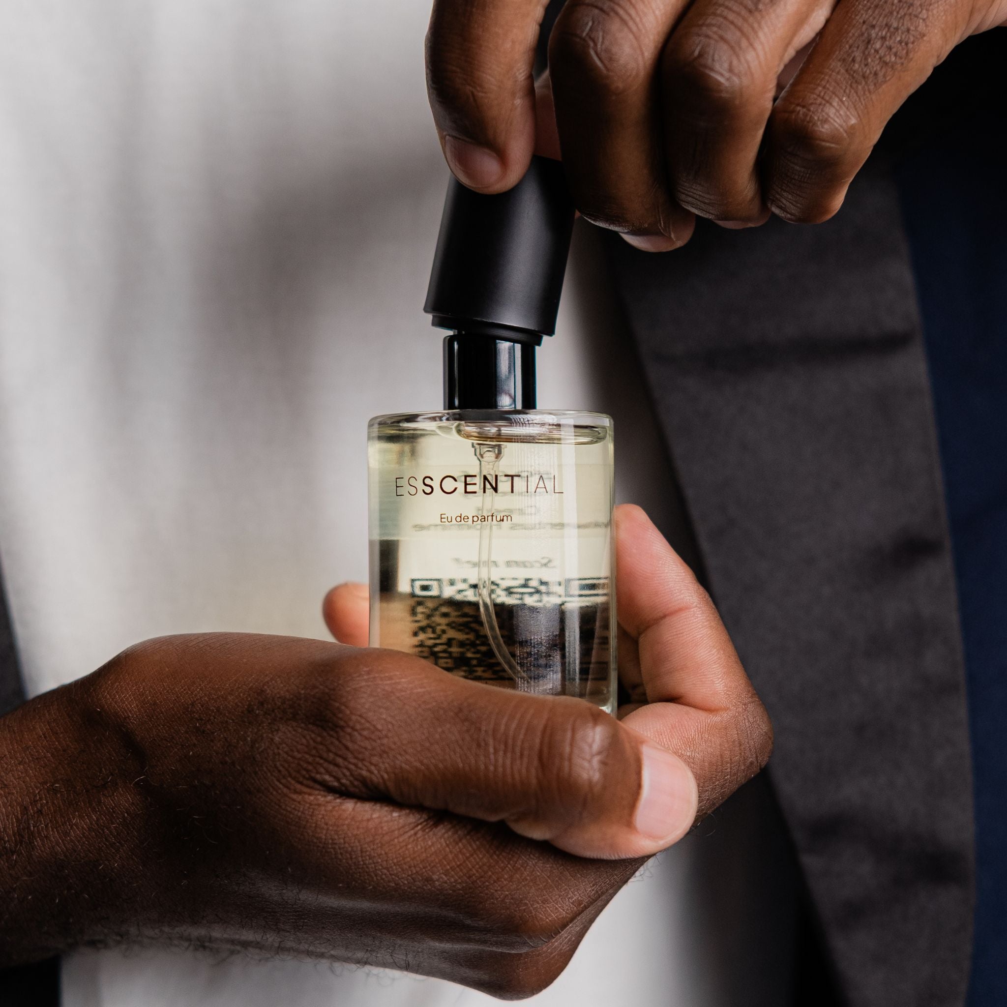  Man opening his cologne lid South Africa