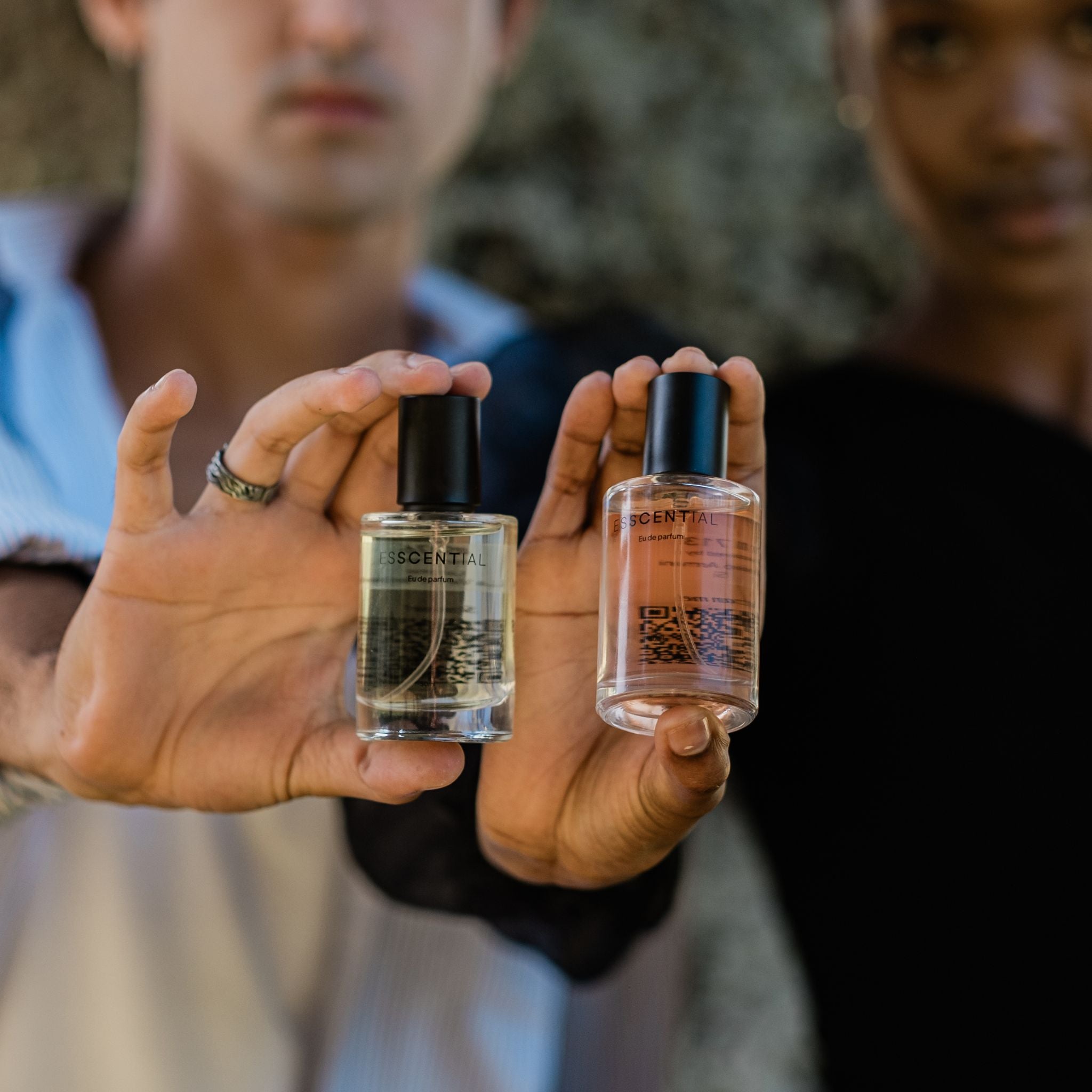  Man and woman holding affordable inspired by perfume and cologne South Africa