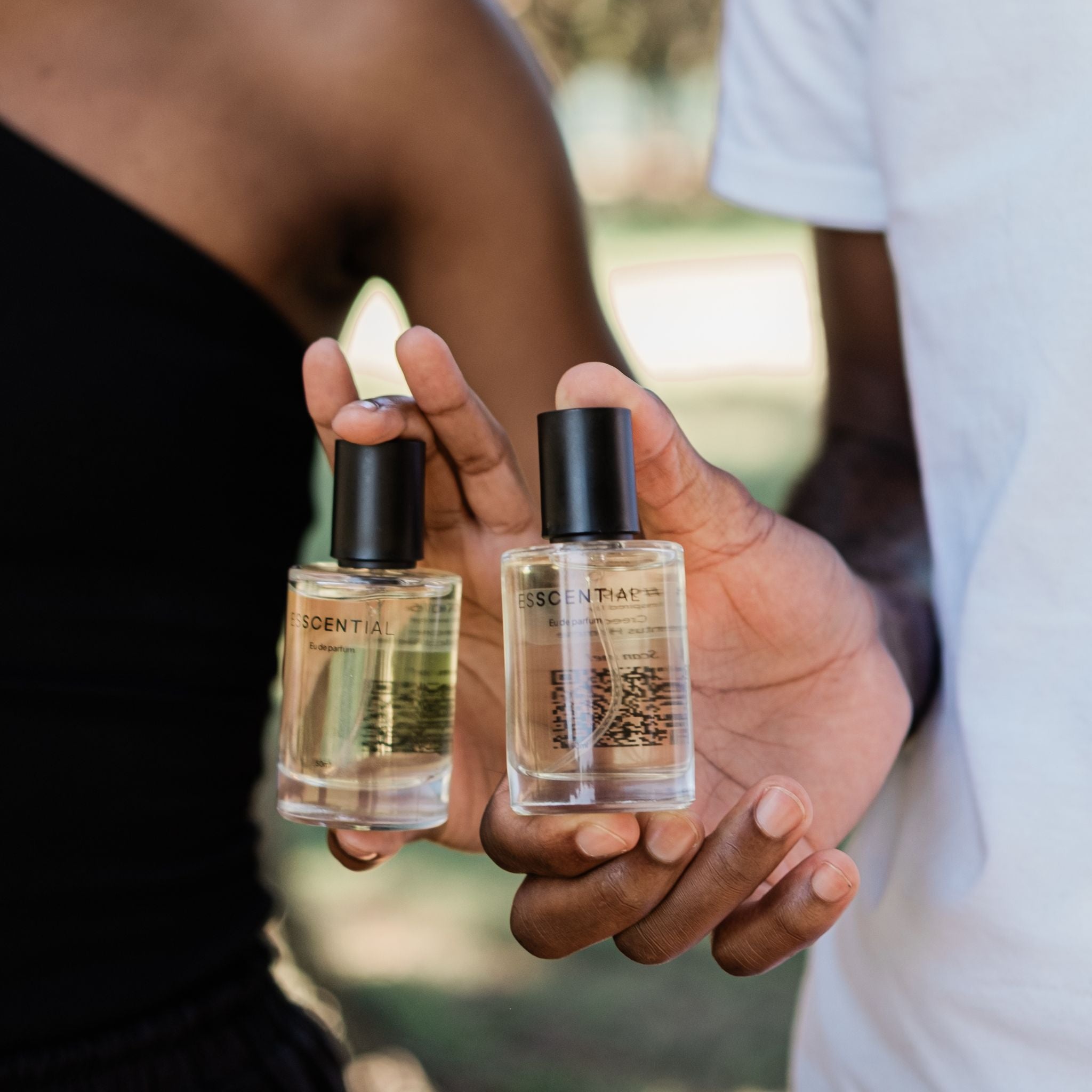  Woman and man holding affordable inspired by fragrance South Africa