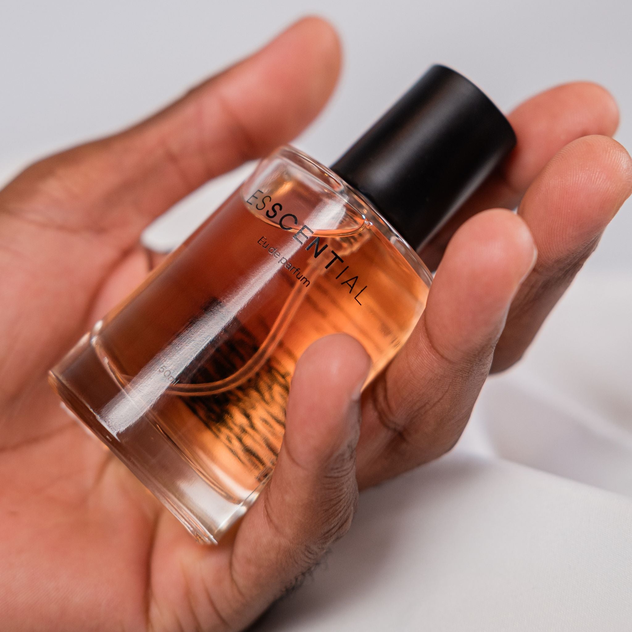  Hand holding the most affordable inspired by fragrance South Africa
